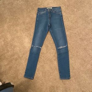 Distresses top shop jeans